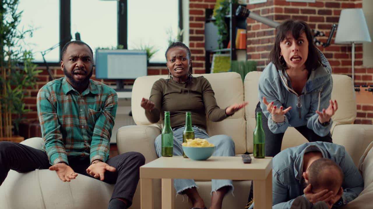 Diverse people being angry about lost football match