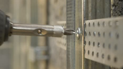 installing metal profile frame on the brick wall