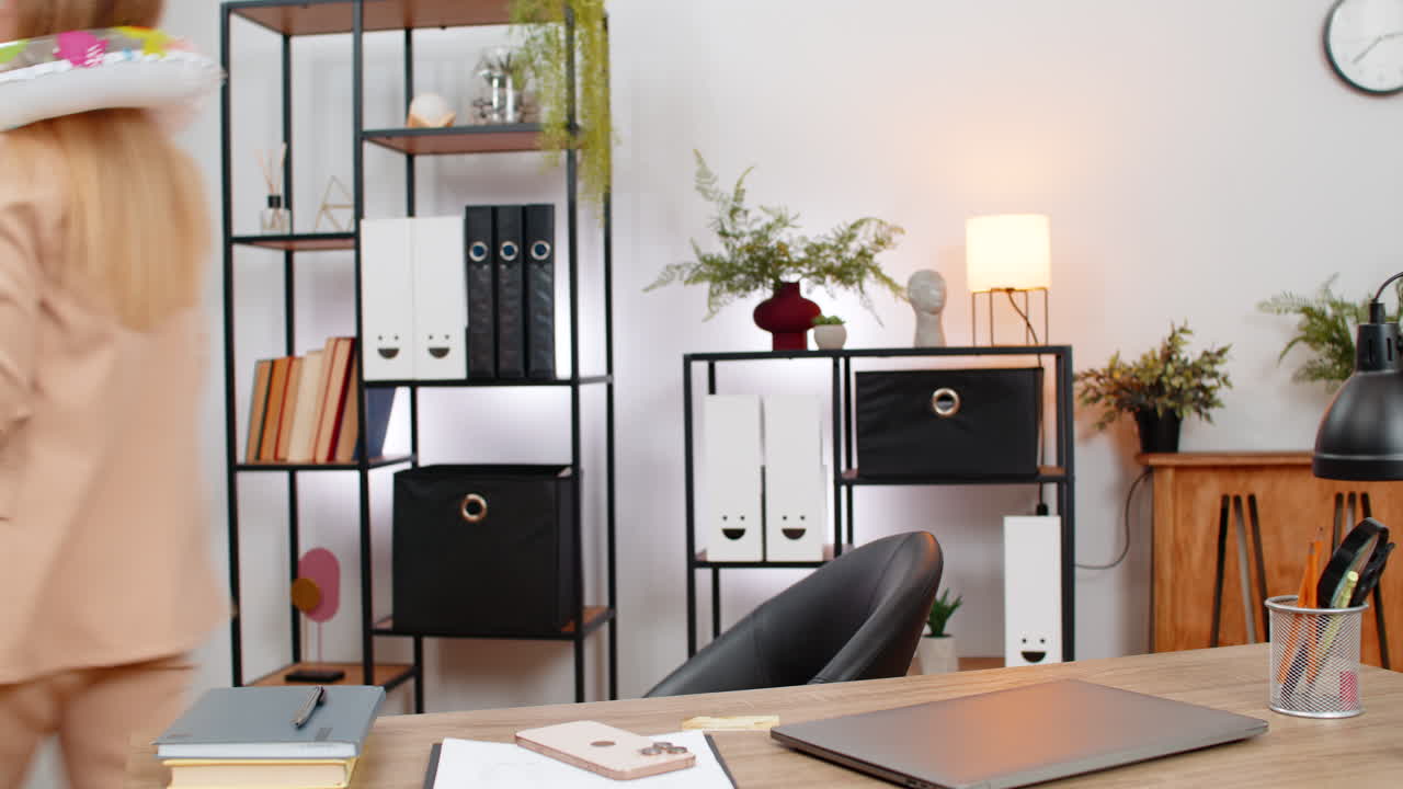 Businesswoman buys vacation tickets with credit card and smartphone smiles ends work wears swim ring