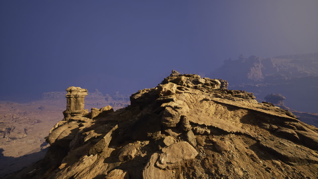 Rock formations under a clear sky in a desert landscape during daylight