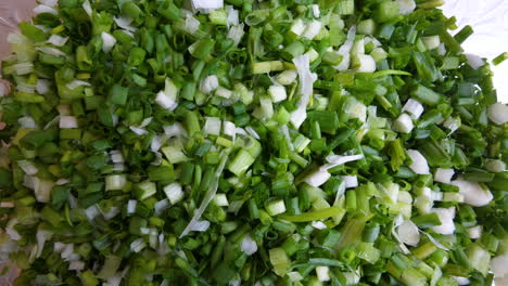 sliced green onions in a recipe close shot cooking kitchen healthy food