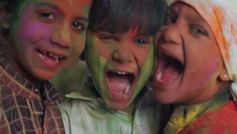 kids celebrating the hindu festival of holi in rajasthan, india