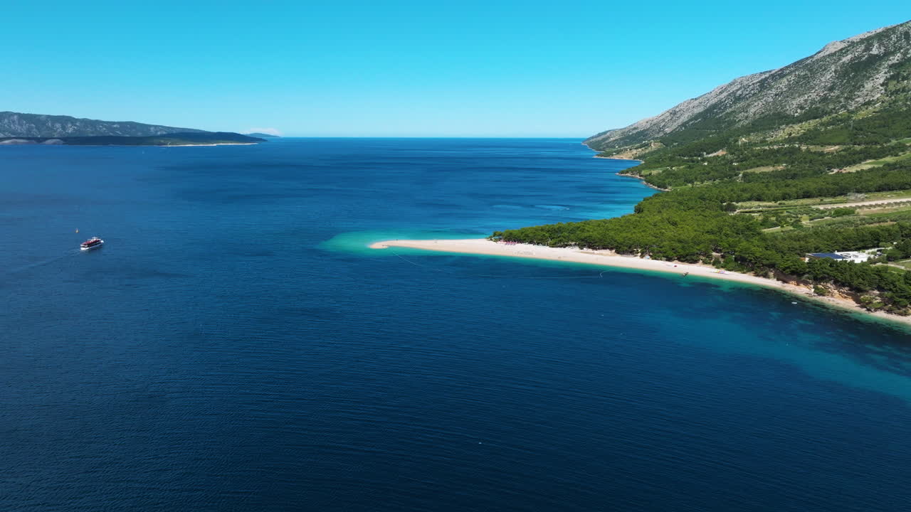 Serene View Of Zlatni Rat Beach On The Island Of Brac, Croatia. Aerial Drone Shot