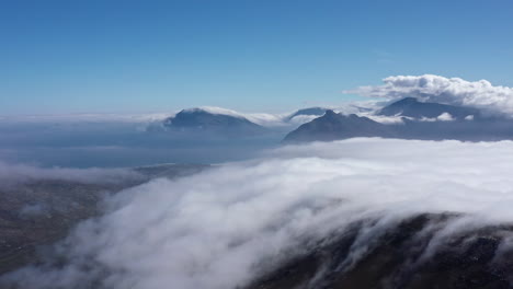 Cloudscape-beautiful-aerial-view-over-mountains-along-the-ocean-South-Africa