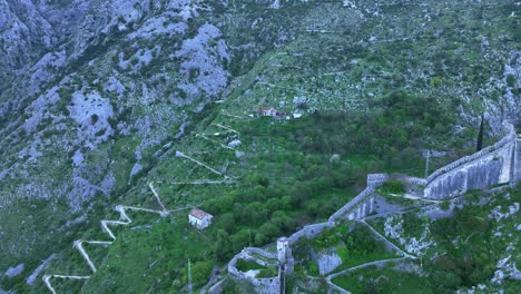 Panning left shot from the Castle Fortress of Kotor following the city walls
