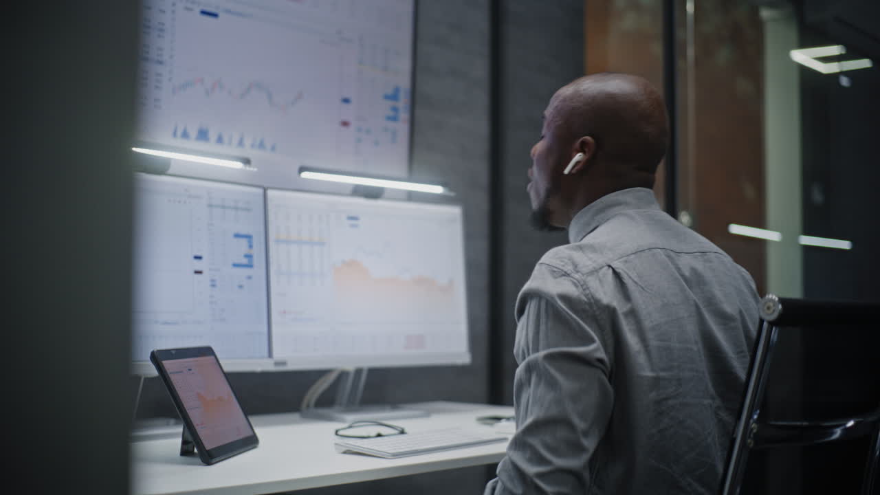 Stock Exchange Broker Shouting During Call, Soaking Financial Loss, Monitoring Real-Time Stocks on Multi-Monitor Computer in Office. African American Investment Agent Angry About Bad Economy News.