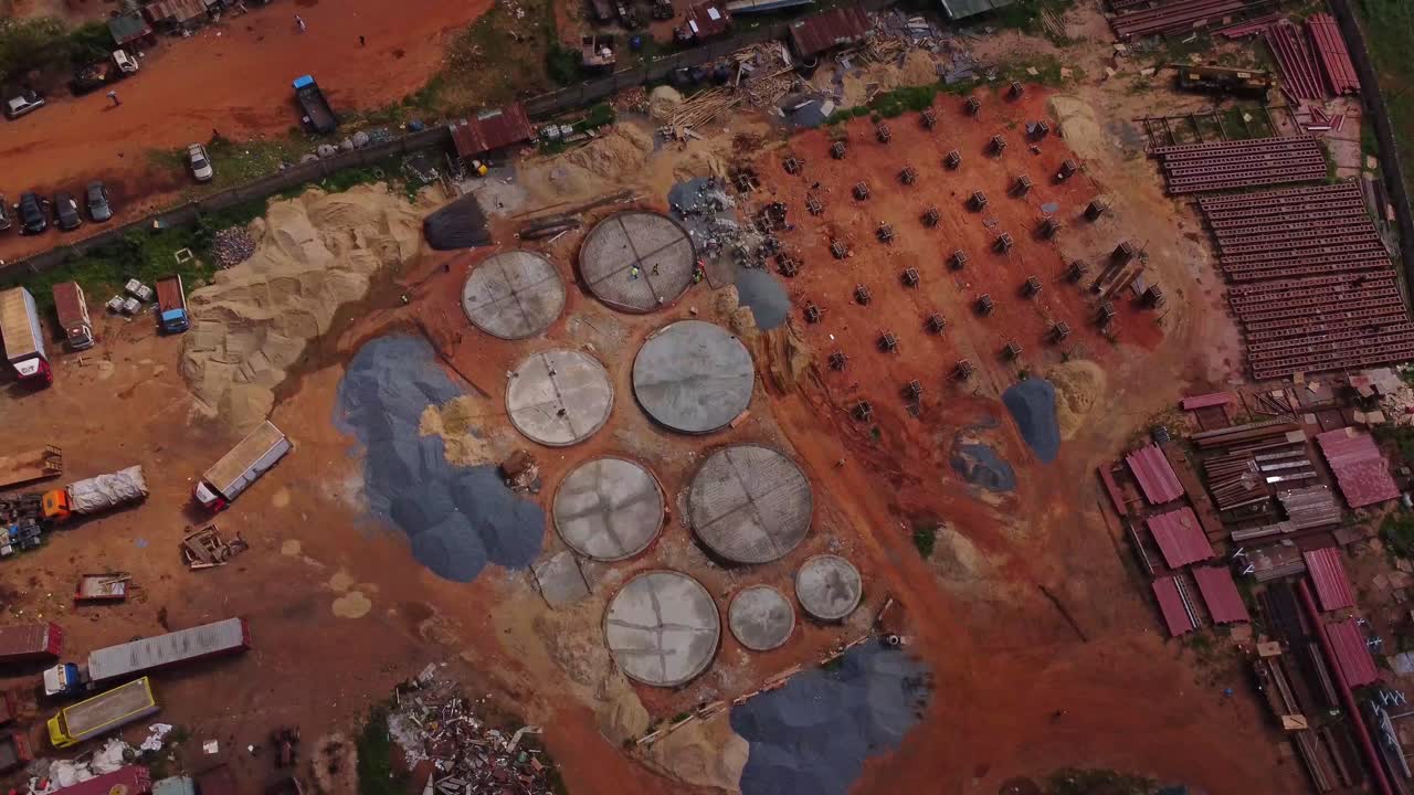 Aerial of a large construction site on a industrial lot in Ibadan, Nigeria on a sunny day