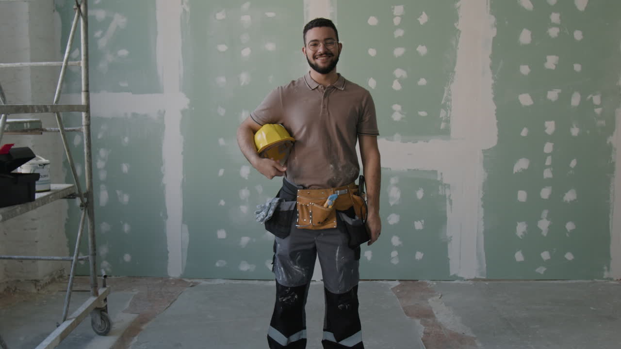 Construction worker in a renovated room