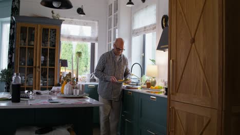 man cooking in a modern kitchen