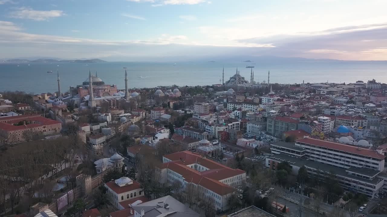 Static Aerial View of Istanbul Turkey, Ayasofya and Sultan Ahmed Mosques in Twilight with Neighborhood