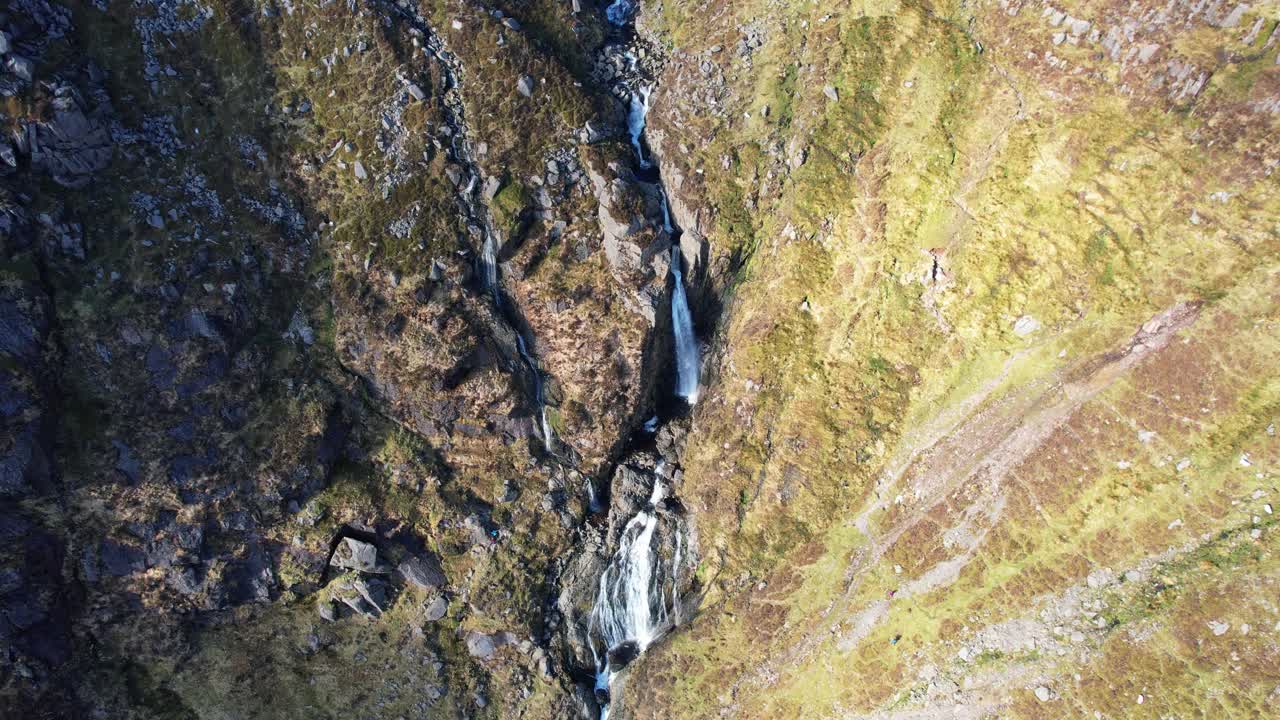 Irish mountain landscapes drone looking down on flooded Mahon Falls comeraghs Waterford Ireland Epic Locations