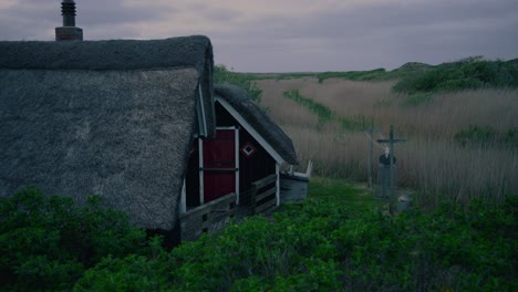 abandoned house in stormy conditions, cinematic sinister dark