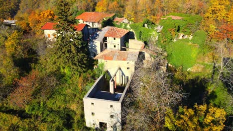 aerial 4k drone video unveils the haunting beauty of slapnik, an abandoned village in brda, slovenia