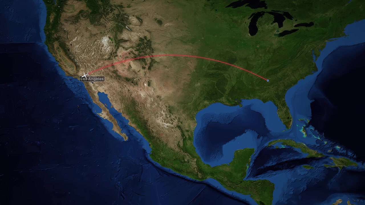 Satellite map animation tracks a plane flying from Atlanta to Los Angeles with red line