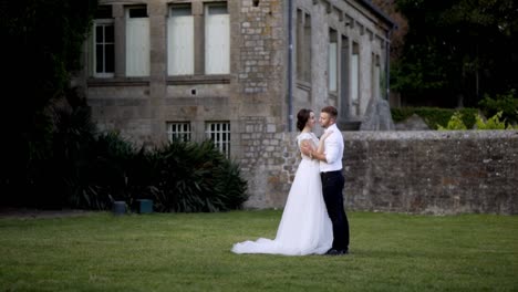 couple kissing in a garden