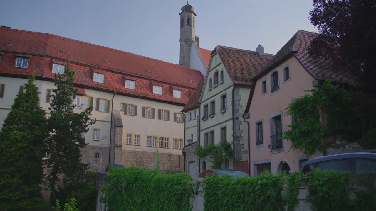 View of the historic buildings in Rothenburg ob der Tauber with red rooftops