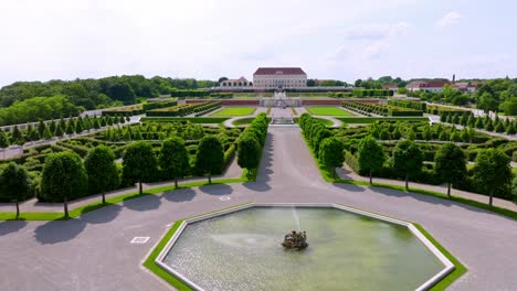 schloss hof complex from water fountain surrounded by baroque garden in austria