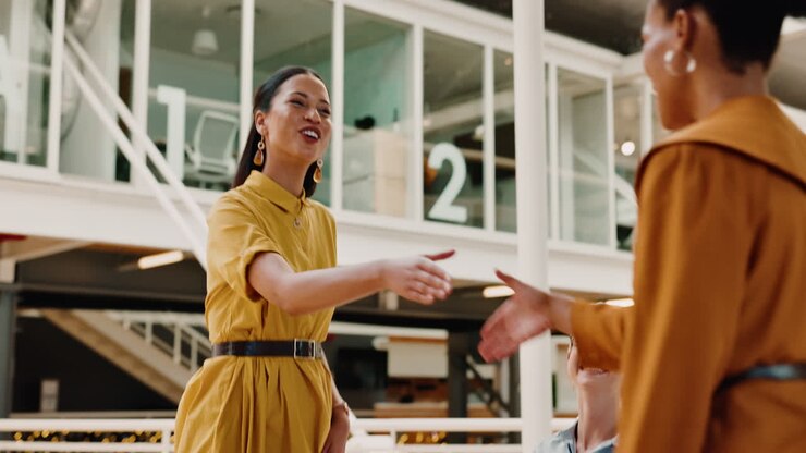 Handshake, women and business collaboration