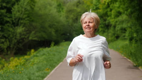 senior woman running in park