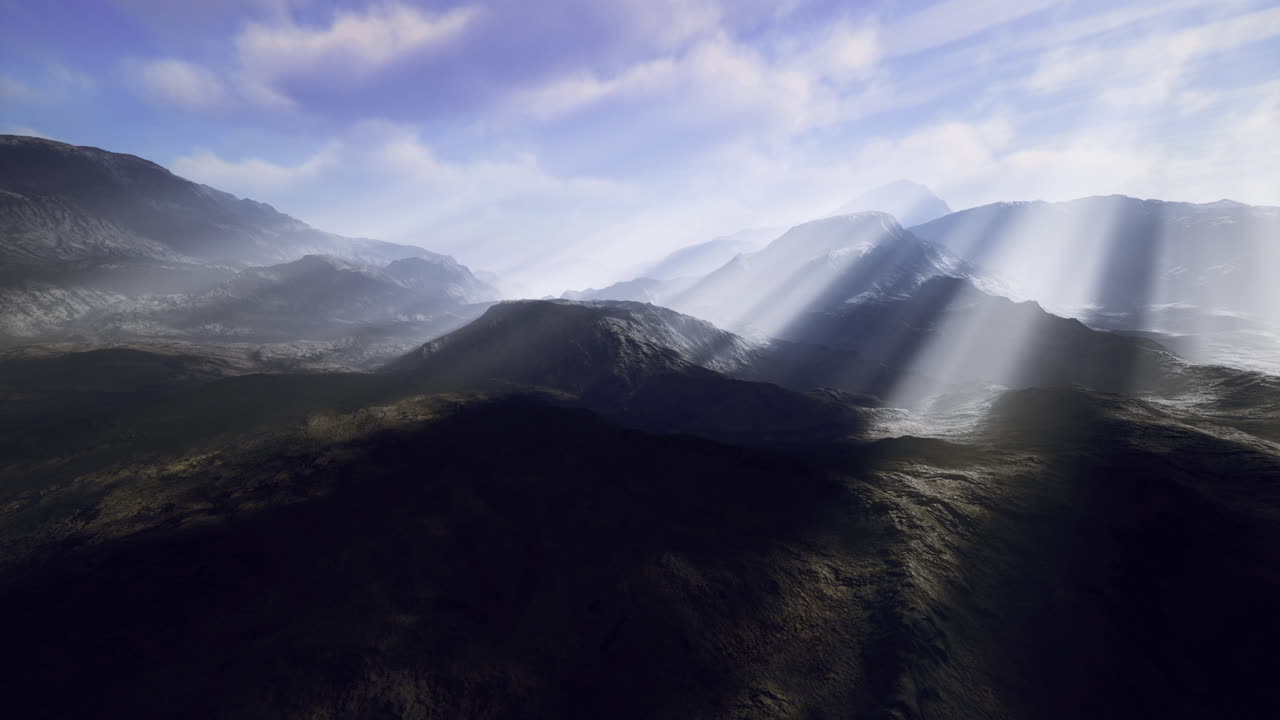 Breathtaking mountain landscape showcasing sunlight through clouds and valleys