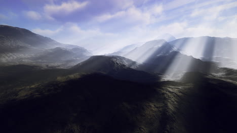 breathtaking mountain landscape showcasing sunlight through clouds and valleys