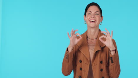 Business-woman,-ok-sign-and-pointing-in-studio