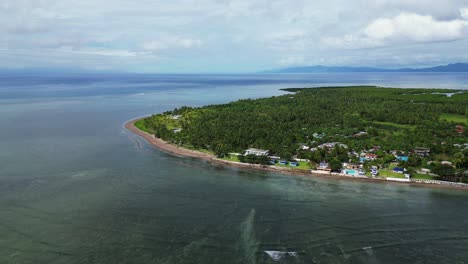 Tropical-Island-With-Town-And-Resort-In-Agojo,-San-Andres,-Catanduanes-Island,-Philippines