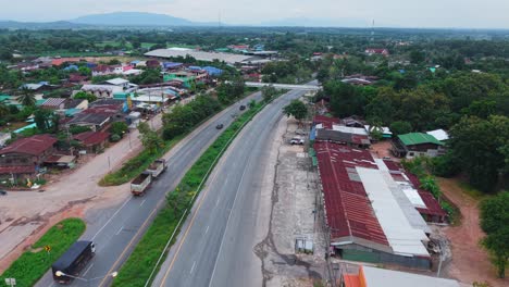 highway through a southeast asian village