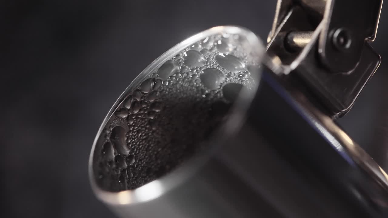 Hot Water Pouring Into a Cup