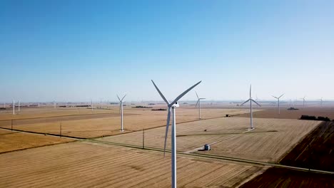 industrial wind turbines in beautiful rural countryside landscape