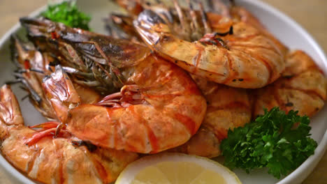 grilled tiger prawns or shrimps with lemon