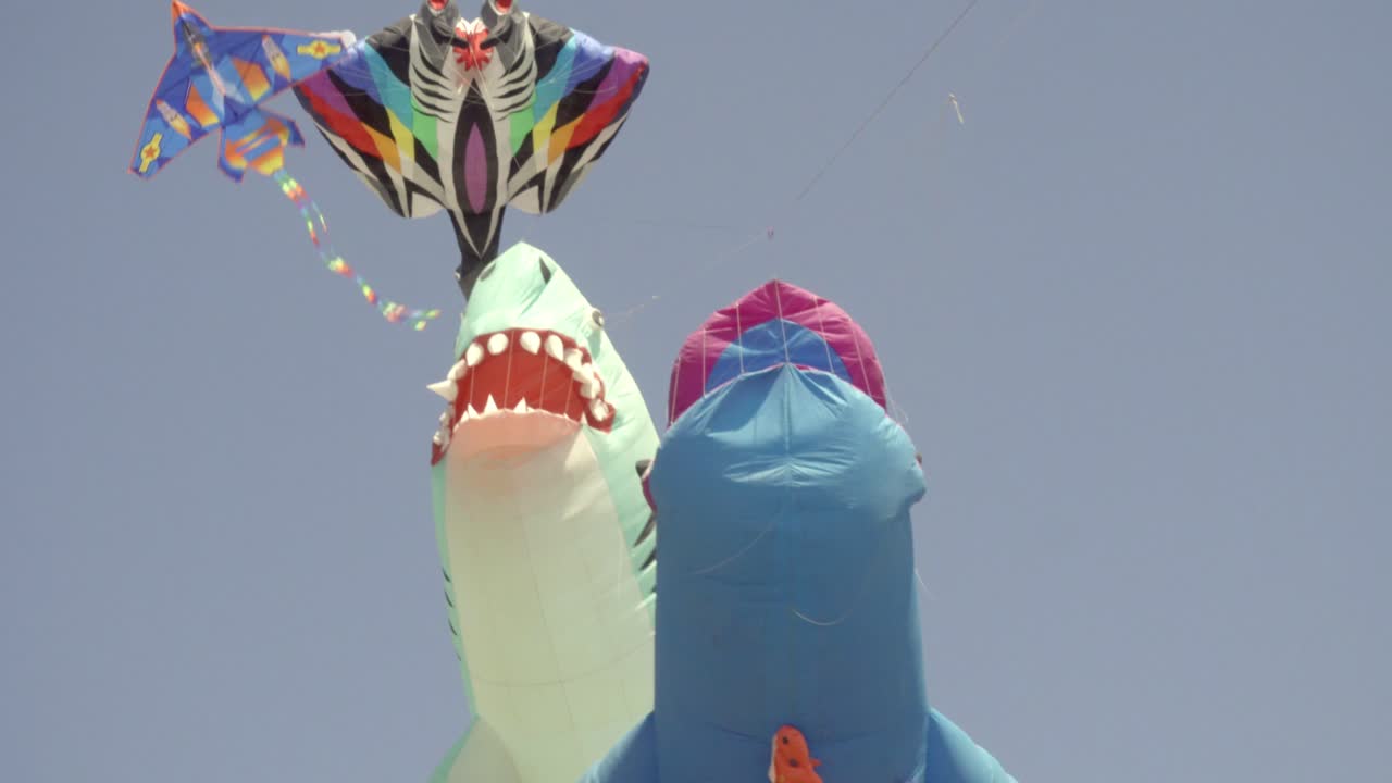 Low angle view of giant kites flying at festival in Cholula Mexico