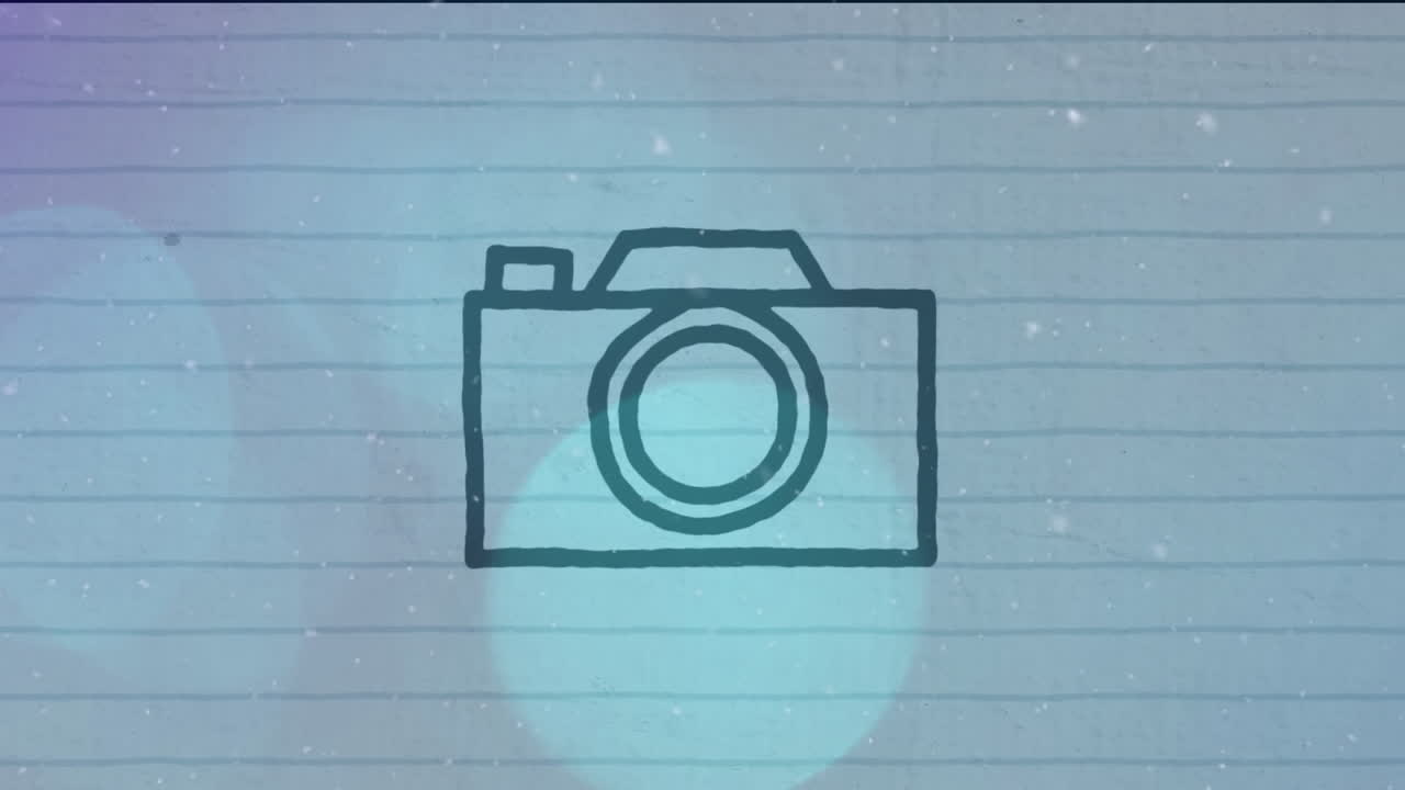 라인 된 종이 배경에 카메라 아이콘 위에  입자와 파란 bokeh 조명의 애니메이션