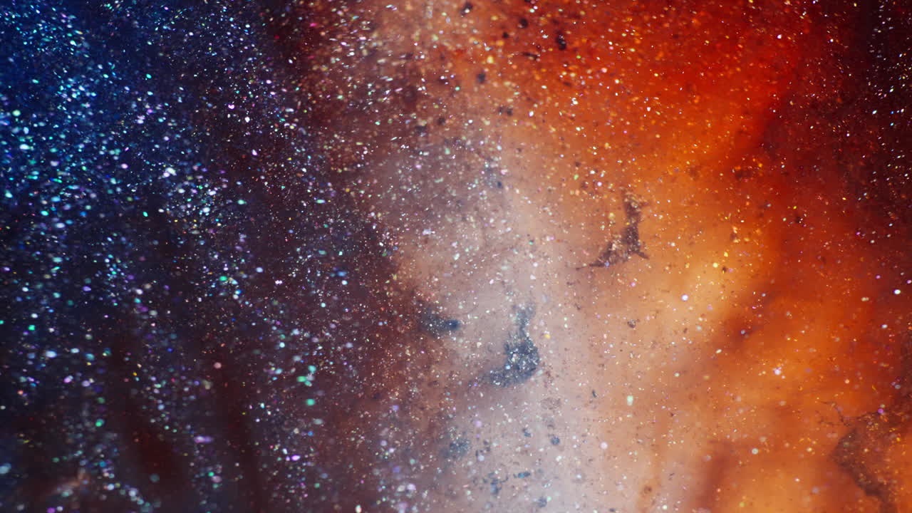 Bright ink simulating the expanding universe. Macro close-up