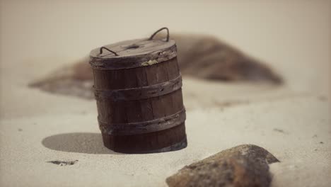 old wooden basket on the sand at the beach