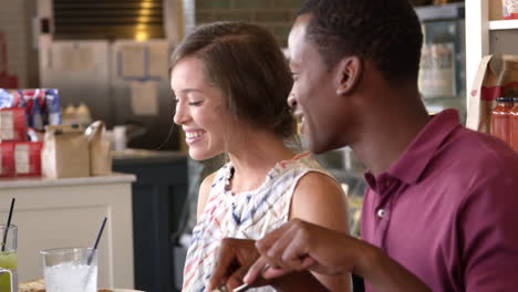 Couple-Enjoying-Lunch-In-Restaurant-Shot-On-R3D