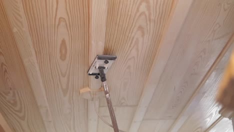 sanding wood ceiling panels