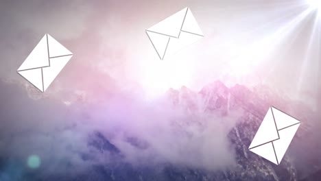 iconos de mensajes múltiples cayendo contra el punto de luz y el paisaje con montañas nevadas