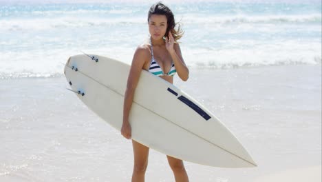 sexy pretty young woman surfer
