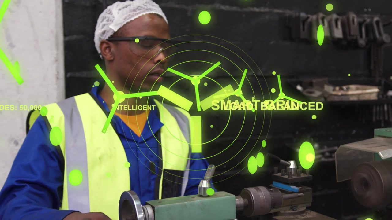Operator lifting part, showing HUD with turbine icons and SMART GRID, aligning part at lathe