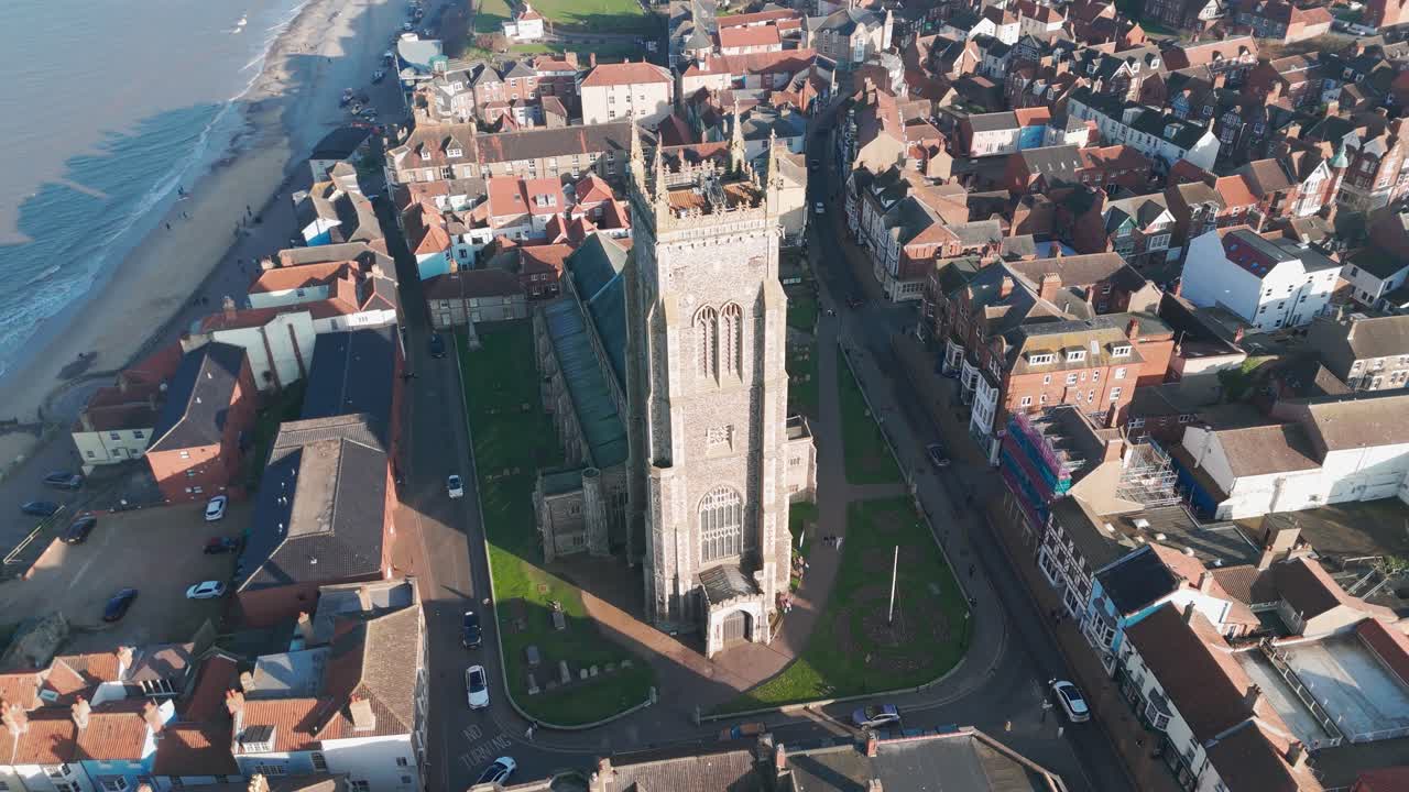 Historic church in Cromer, Norfolk, with surrounding town and coastline in view