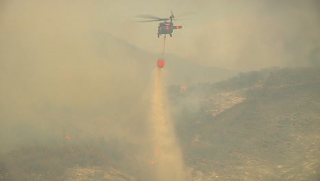 firefighting helicopters make water drops on the thomas fire in santa barbara california 4