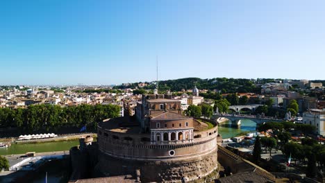 aerial boom shot reveals castel sant'angelo and tiber river in rome, italy