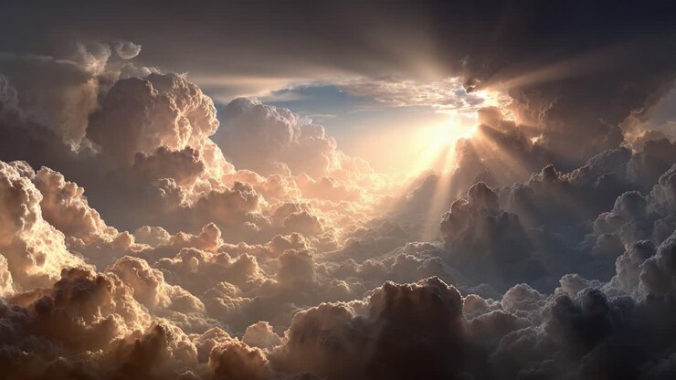 A majestic portrayal of nature's grandeur, showcasing the mesmerizing dance of light and shadow among clouds as the sun breaks through the horizon, creating a breathtaking atmosphere