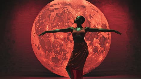 a dancer poses gracefully in front of a large, red moon backdrop