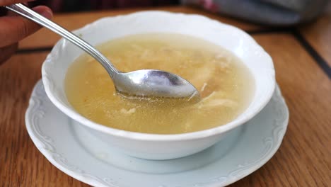 delicious chicken soup in a white bowl