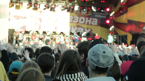 people dance during the open-air concert