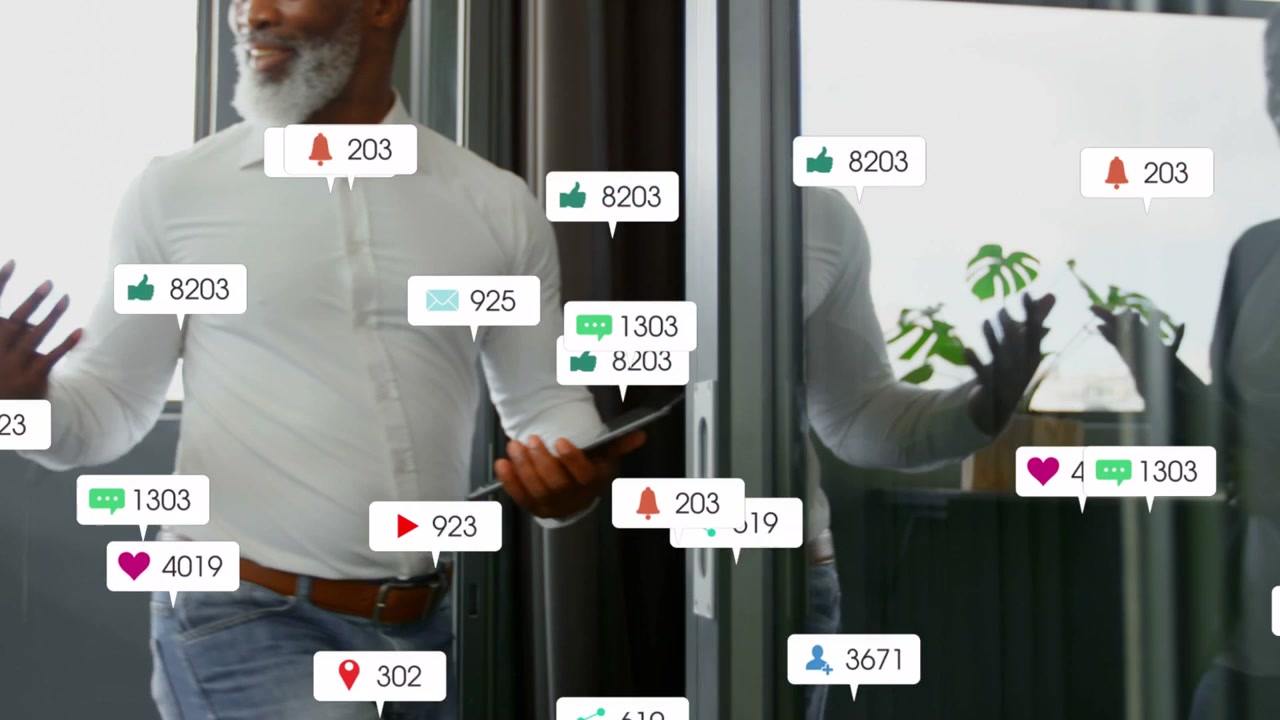 Manager walking hall tapping tablet, sharing business metrics as social icons growing around glass
