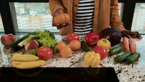 man sorting vegetables