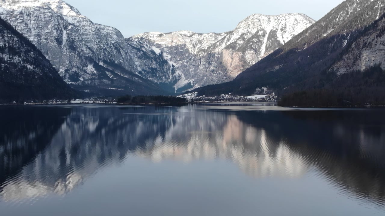 Mirror Calm Lake Reflecting Winter Town And Cliffs, Soft Dawn Light, Imagined Early Commuter Walking Pier,